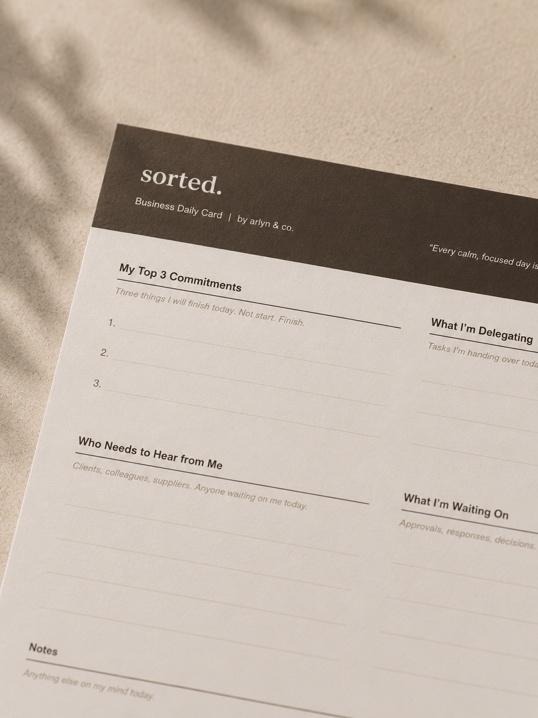 Close up detail of the Sorted. Business Daily Card showing premium paper texture and intentional layout design.
